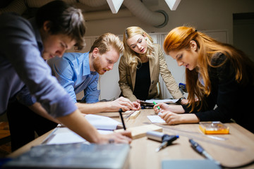 Classmates working on a project together