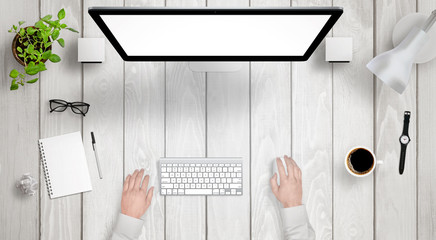 Poster - Modern desk with isolated computer display top view. Designer works with a mouse and keyboard. Coffee, lamp, paper, glasses, plant, watch on table.