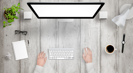 Poster - Modern desk with isolated computer display top view. Designer works with a mouse and keyboard. Coffee, lamp, paper, glasses, plant, watch on table.
