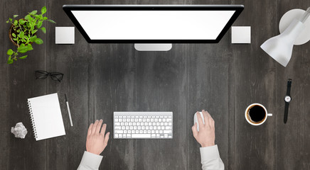 Leinwandbilder - Modern desk with isolated computer display top view. Designer works with a mouse and keyboard. Coffee, lamp, paper, glasses, plant, watch on table.