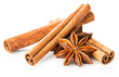 Cinnamon stick and star anise spice close-up isolated on white background.