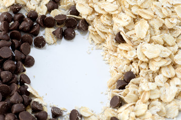 Wall Mural - raw material chocolate chip closeup shot for with oat seed