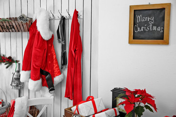 Interior of Santa Claus home on white wooden wall