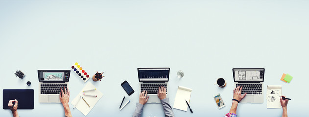 colleagues busy working laptop office concept