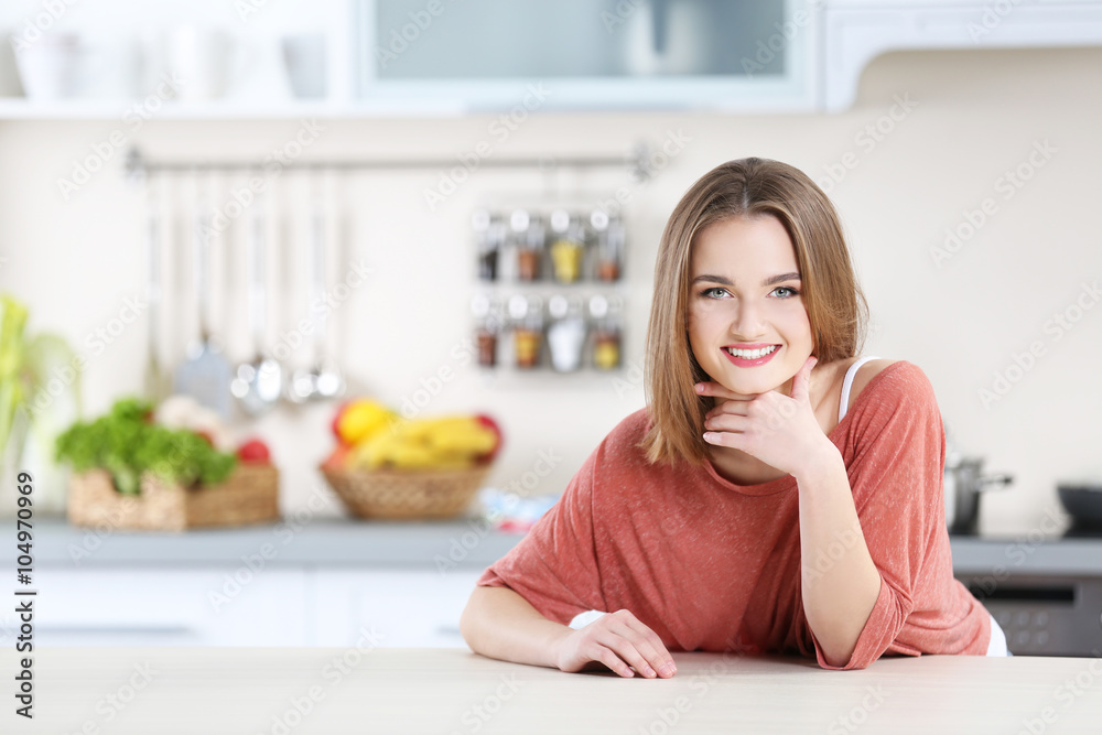 Young woman in the kitchen