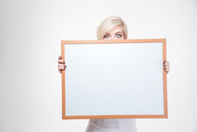 Blonde Woman Peeking From Blank Board