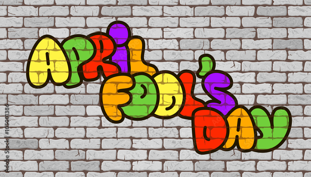 April Fools Day graffiti on the background wall of white bricks