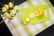 Sliced lemons and flowers on a napkin