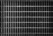 Metal grid background.Metal grill pattern texture. Black and white image.