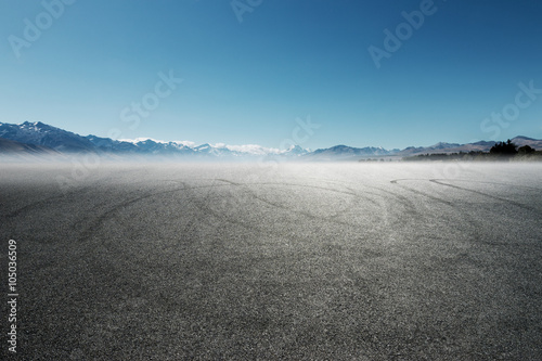Fotografie, Obraz asphalt road near lake in summer day in New Zealand