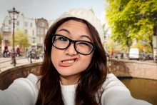 Composite Image Of Asian Woman Making Faces