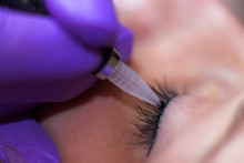 Cosmetologist Applying Permanent Makeup On Eyes
Selective Focus And Shallow Depth Of Field
