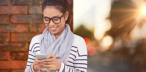 Poster - Composite image of smiling asian woman using smartphone