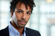 Horizontal headshot of an attractive african american businessman shot with shallow depth field.