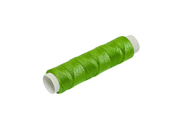 Poster - Green cotton reel isolated on white background