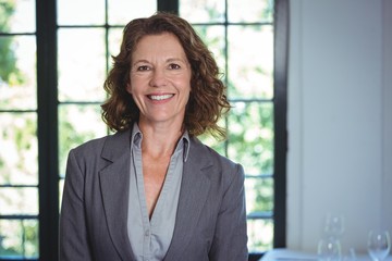 Smiling businesswoman posing