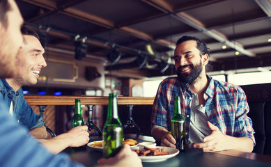 Sticker - happy male friends drinking beer at bar or pub