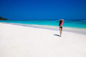 Free Happy Woman Enjoying tropical beach nature. Wellness. Trave