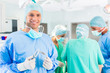 © Kzenon - Hospital surgeons operating in operation room