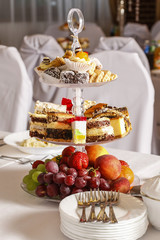 Sticker - Assorted cakes, cookies and fruits on glass cake stand