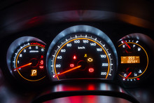 Modern Car Instrument Dashboard Panel In Night Time
