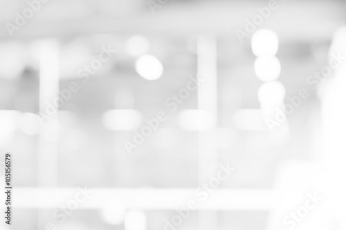 Fotografering abstract white and gray bokeh lights background with motion blur