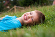 © nadianb - Smiling little boy in the grass