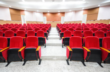 Rows Of Red Chairs In Auditorium