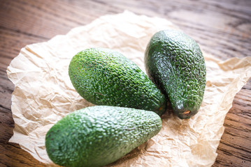 Wall Mural - Avocado on the wooden background