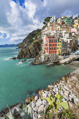 Riomaggiore fisherman village in a dramatic windy weather. Rioma