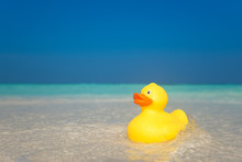 Yellow Duck On The Tropical Beach. Concept Travel And Vacation