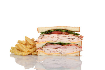 Wall Mural - sliced chicken club sandwich with french fries