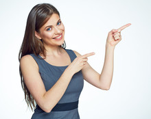 Smiling Business Woman Pointing Finger On Copy Space