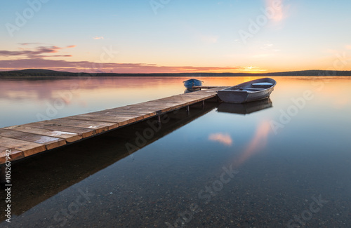 boats at the pier on the lake