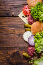 Ingredients For Hamburgers On Wooden Table, Border Background