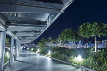 Aufkleber - Empty pedestrian walkway in midtown at night