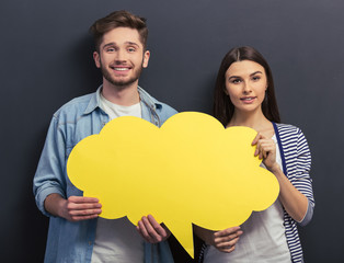 Young couple with speech bubbles