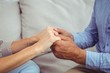 © WavebreakMediaMicro - Close-up of man and woman holding hands