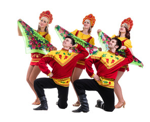 Wall Mural - Dancer team wearing a folk costumes isolated on white