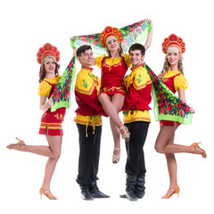 Dancer team wearing a folk costumes isolated on white