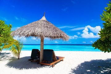 Wall Mural - Beach chairs on the tropical beach