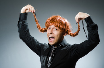 Funny man with red hair wig