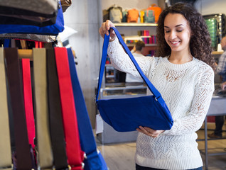 woman purchasing stylish bag