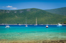 Recreational Boats And Yachts At Anchor In A Beautiful Calm Bay With Dreamy Water
