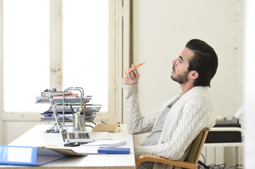 Wall Mural - student preparing university project or hipster style freelancer businessman working with laptop