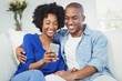 © WavebreakmediaMicro - Happy couple using smartphone