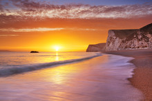 Cliffs At Durdle Door Beach In Southern England At Sunset