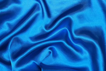 Poster - Curved design on blue silk for pattern and background