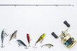 Fishing gear on  white background and space for text