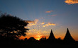© Kokhanchikov - Silhouette of Temples and tree in Bagan at sunset
